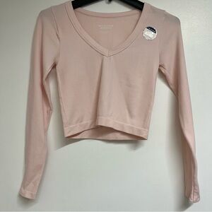 Wallflower Pale Pink Ribbed V‑Neck Long Sleeve Crop Top